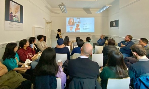 Group of students watching a presentation